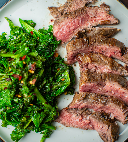 Bavette steak with garlic and chilli kale